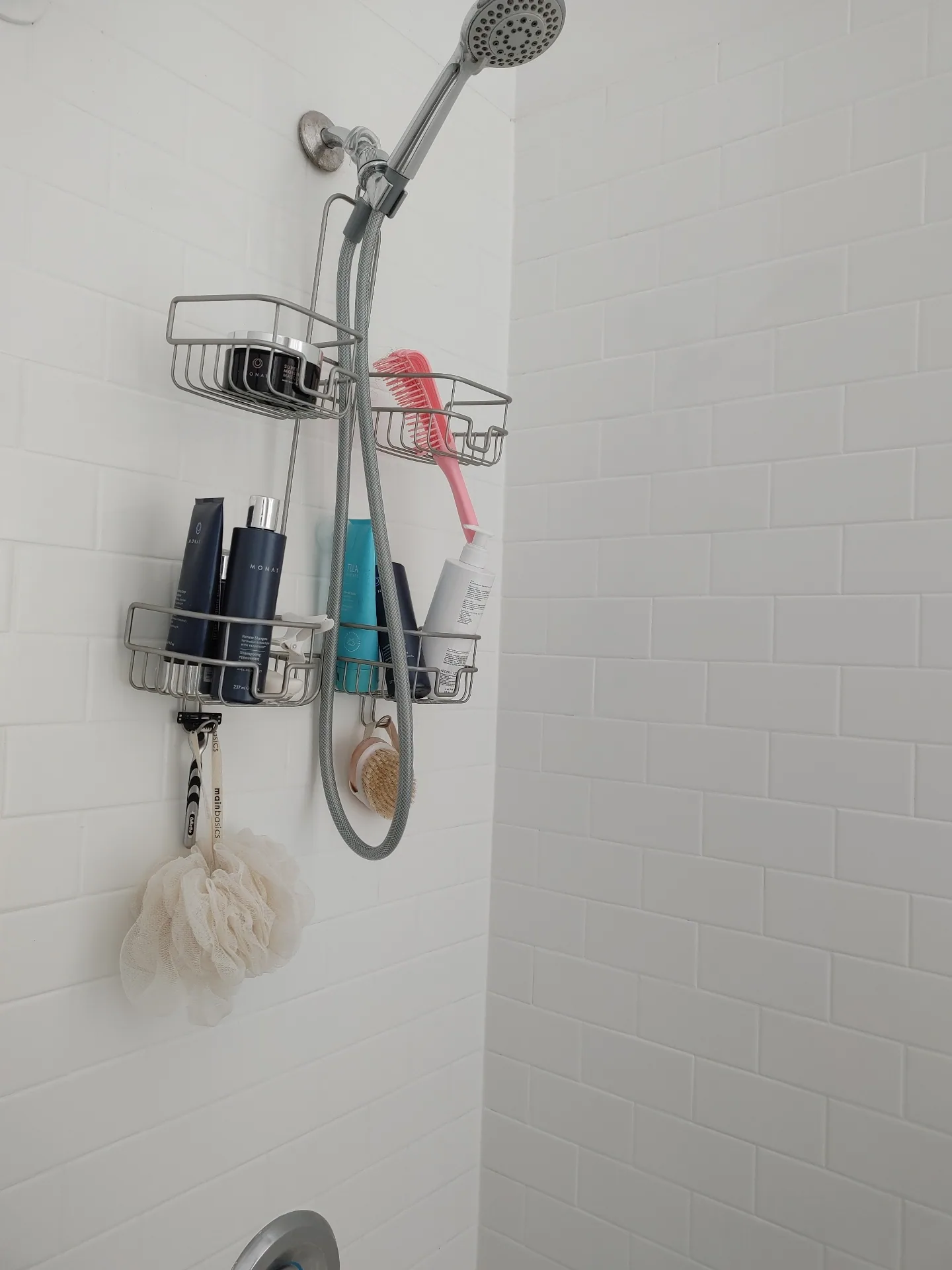 Unit G shower with white subway tile