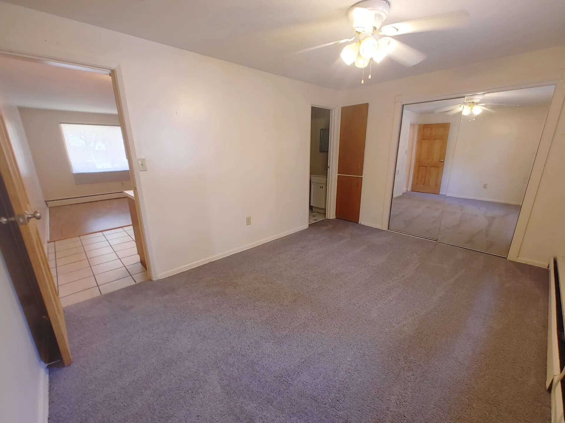1827 N 4th St. Unit 3 alternate bedroom view showing en suite bath entry and large closet