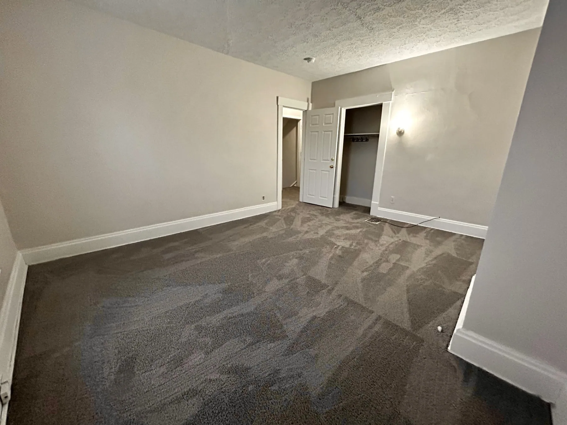68 E Patterson Ave. bedroom with reach-in closet and adjoining hallway