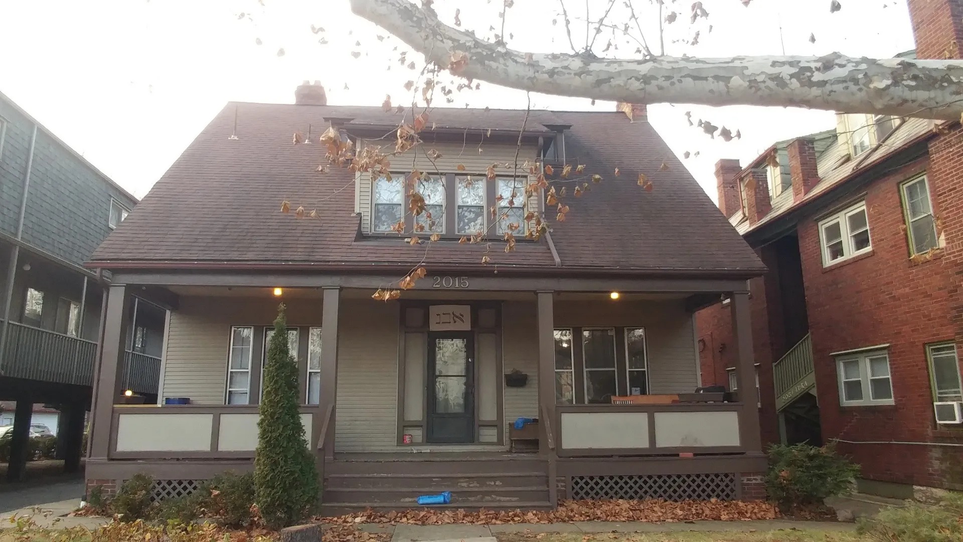 2015 Summit St. exterior — historic two-story home with covered front porch