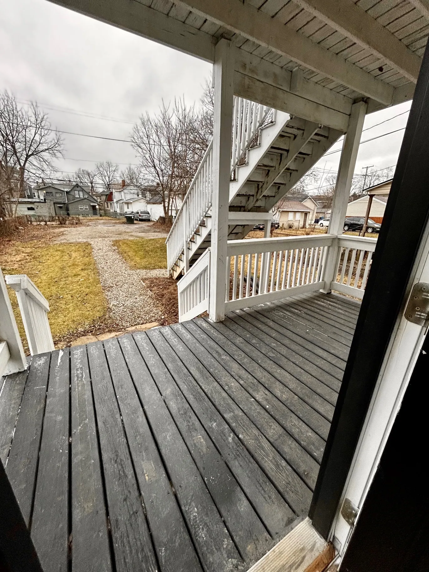 68 E Patterson Ave. covered back porch and stairway with backyard view
