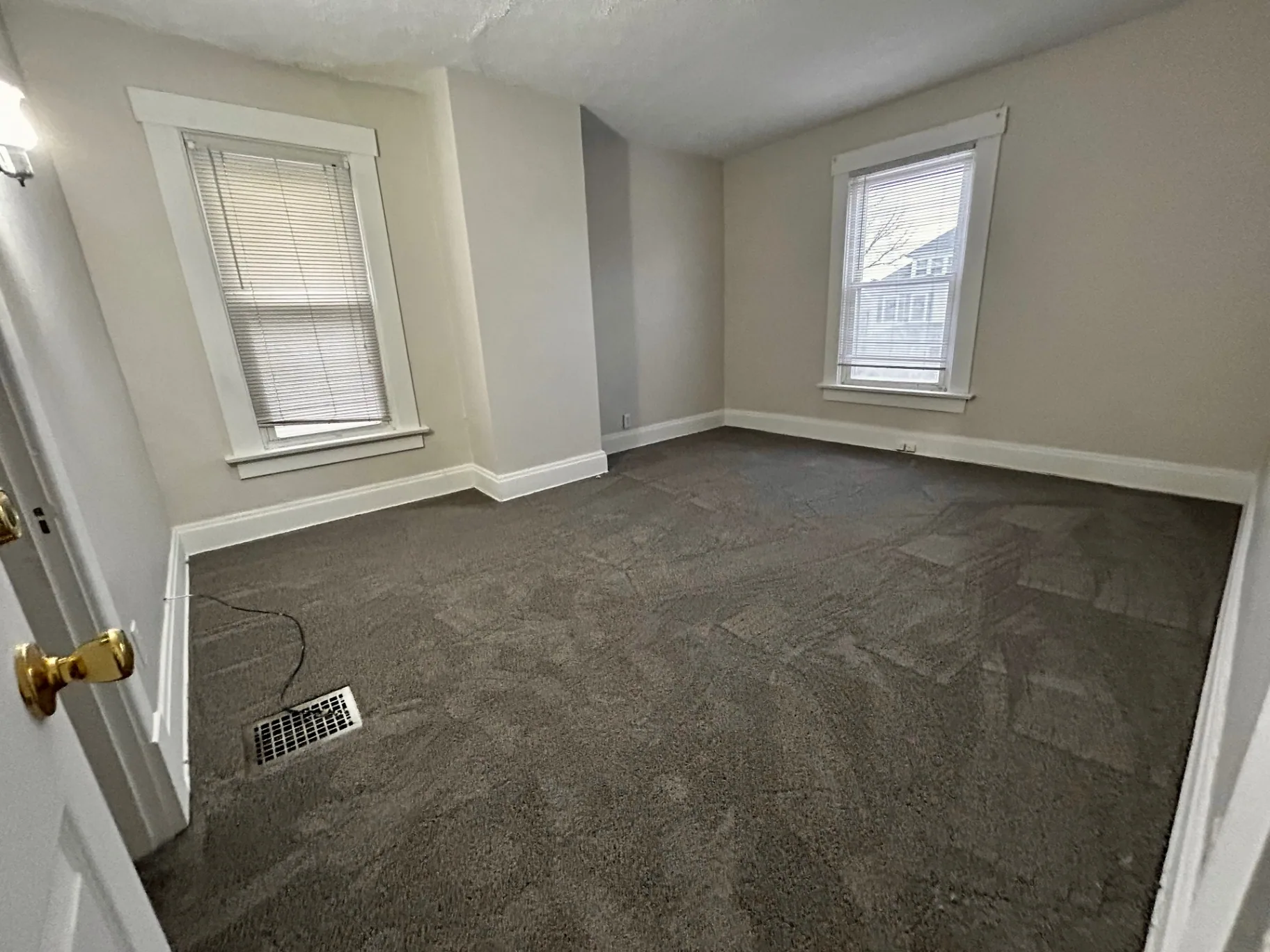 68 E Patterson Ave. bright bedroom with two windows and fresh carpet