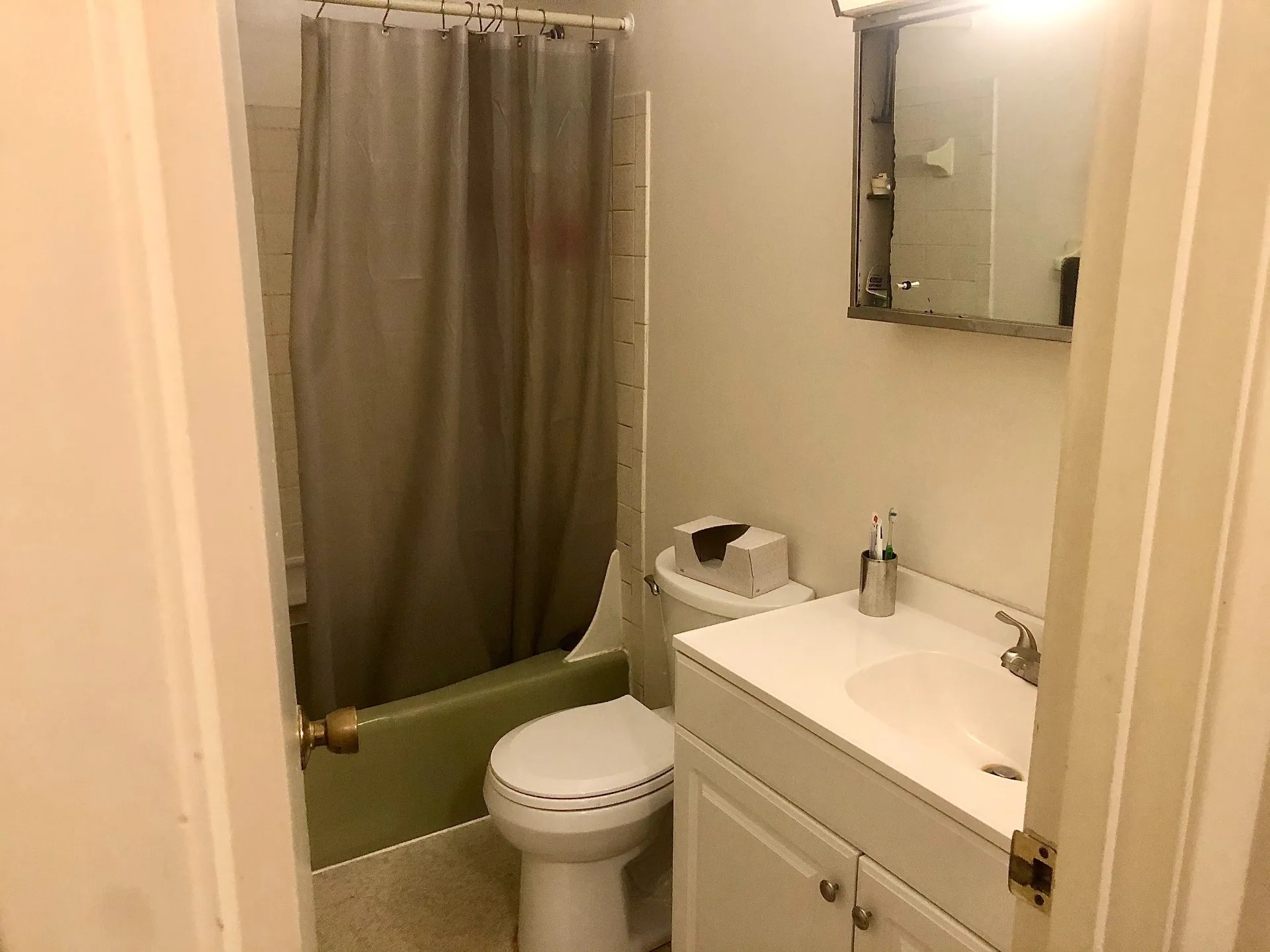 2024 Iuka Ave full bathroom with tub, shower, and vanity