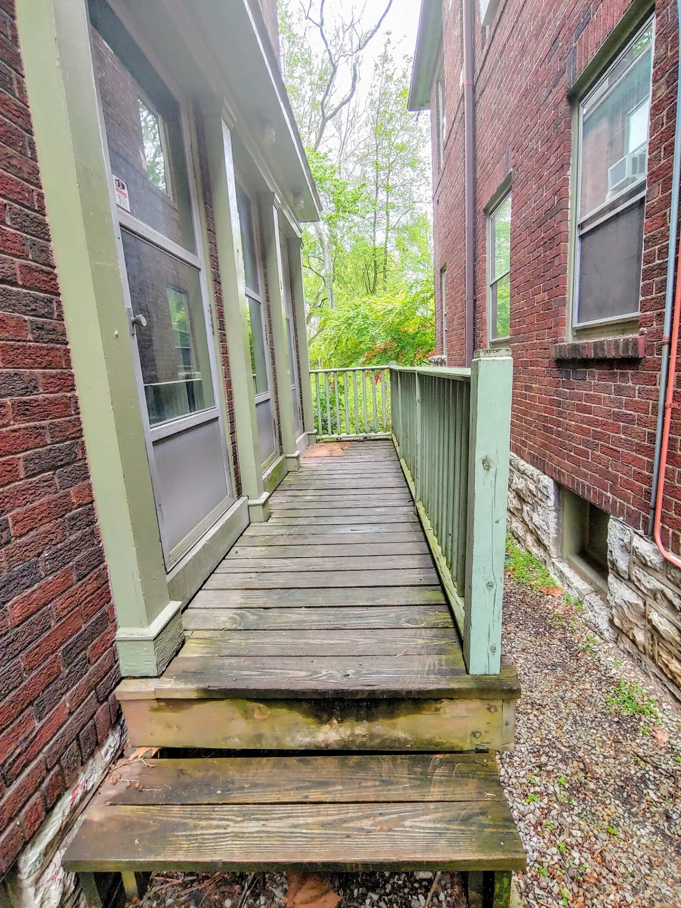 2044 Iuka Ave. B private back porch and stairs overlooking the wooded Iuka Ravine