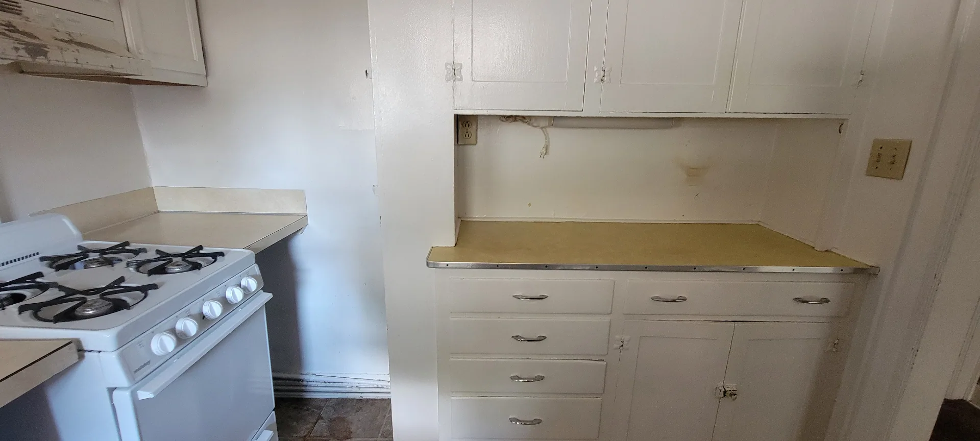 2044 Iuka Ave. D kitchen with abundant original cabinet and drawer storage