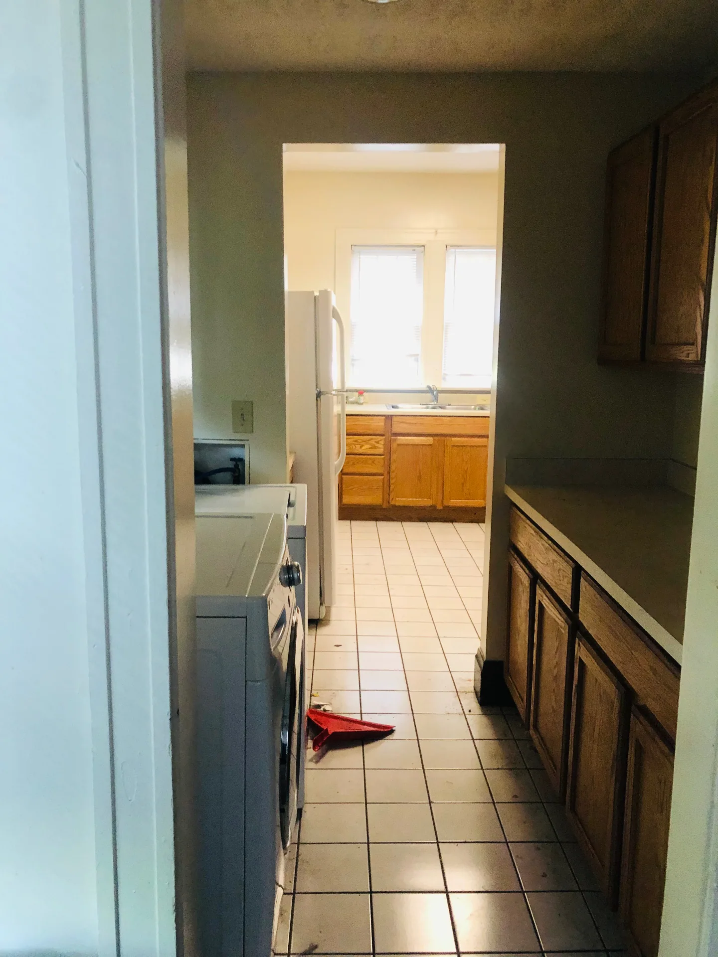 2005 Summit St. in-unit laundry area with washer and dryer just off the kitchen