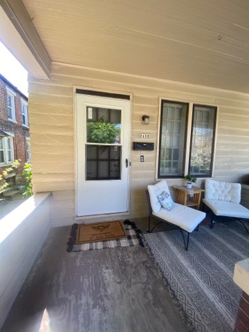 2155 N 4th St. covered front porch entry with seating