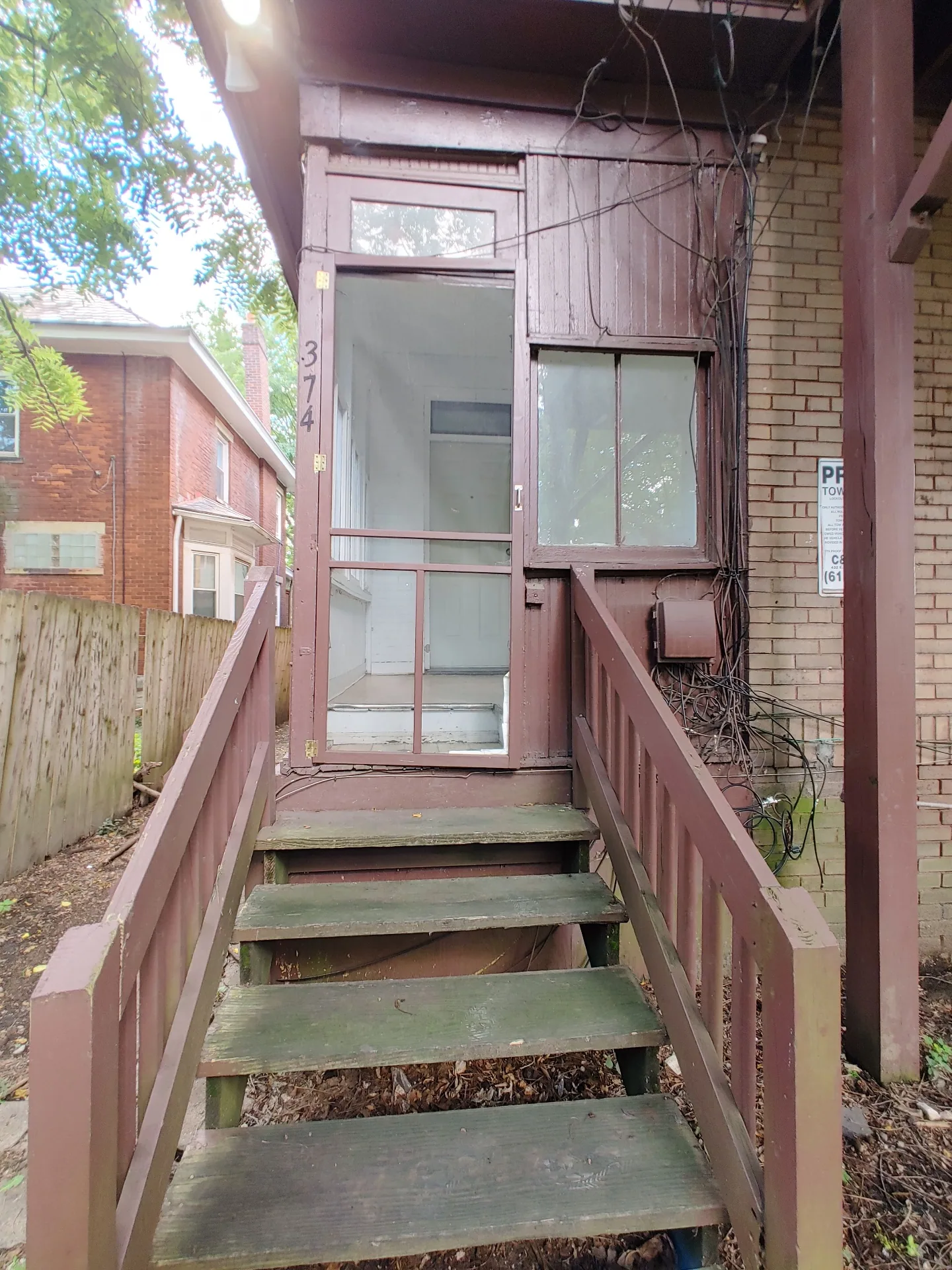 374 A E 14th Ave. private rear entry with wood stairs up to the screened porch door
