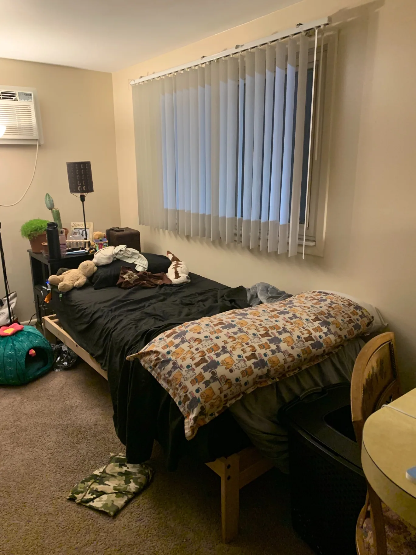 2030 Summit St Unit 1 bedroom with large window and vertical blinds