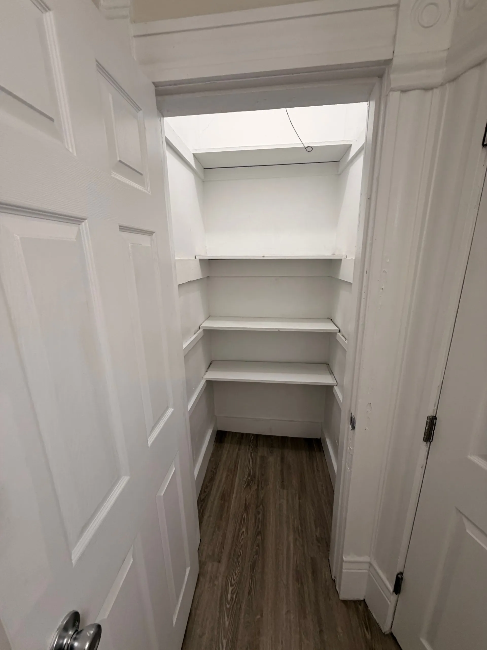 133½ deep linen closet with built-in shelving