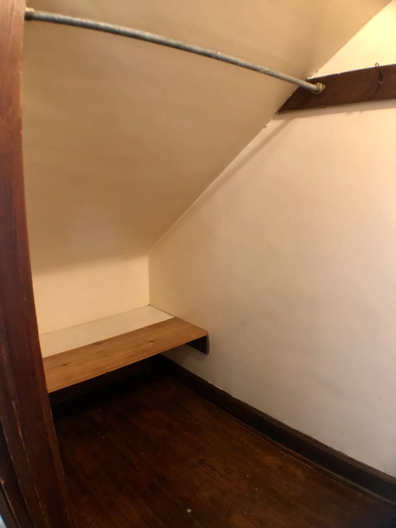 2044 Iuka Ave. A walk-in closet with hanging rod and built-in shelf