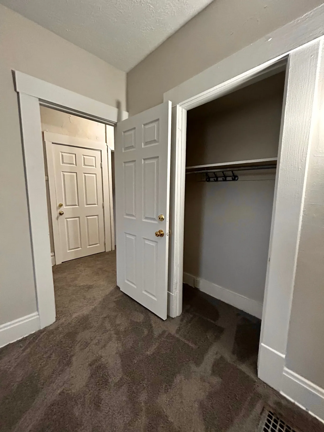 68 E Patterson Ave. upstairs hallway with reach-in closet and multiple doorways