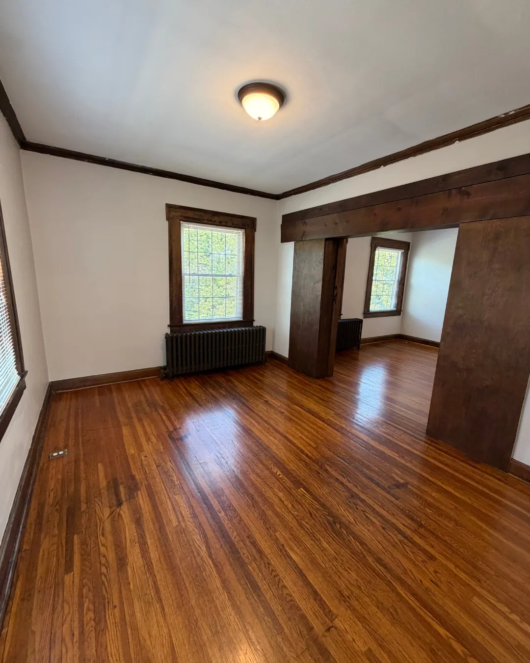 Unit A kitchen with gas range, microwave, and stainless appliances