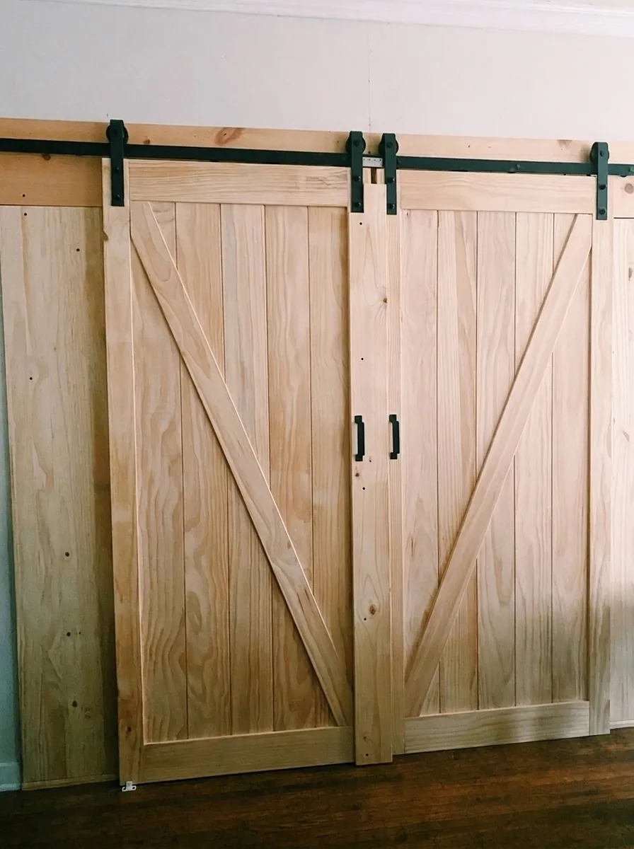 Unit H handcrafted wood barn doors on iron sliding track