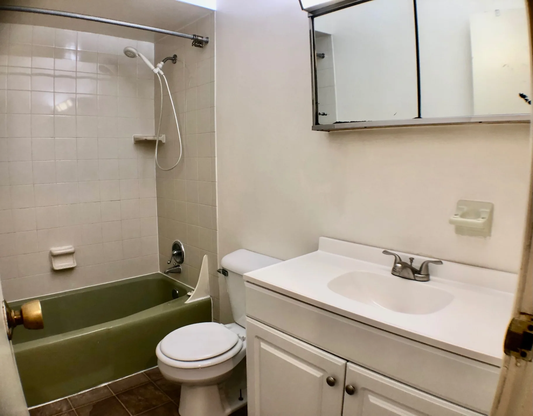 2018 Iuka Ave. bathroom with tub/shower combo, updated vanity, and medicine cabinet