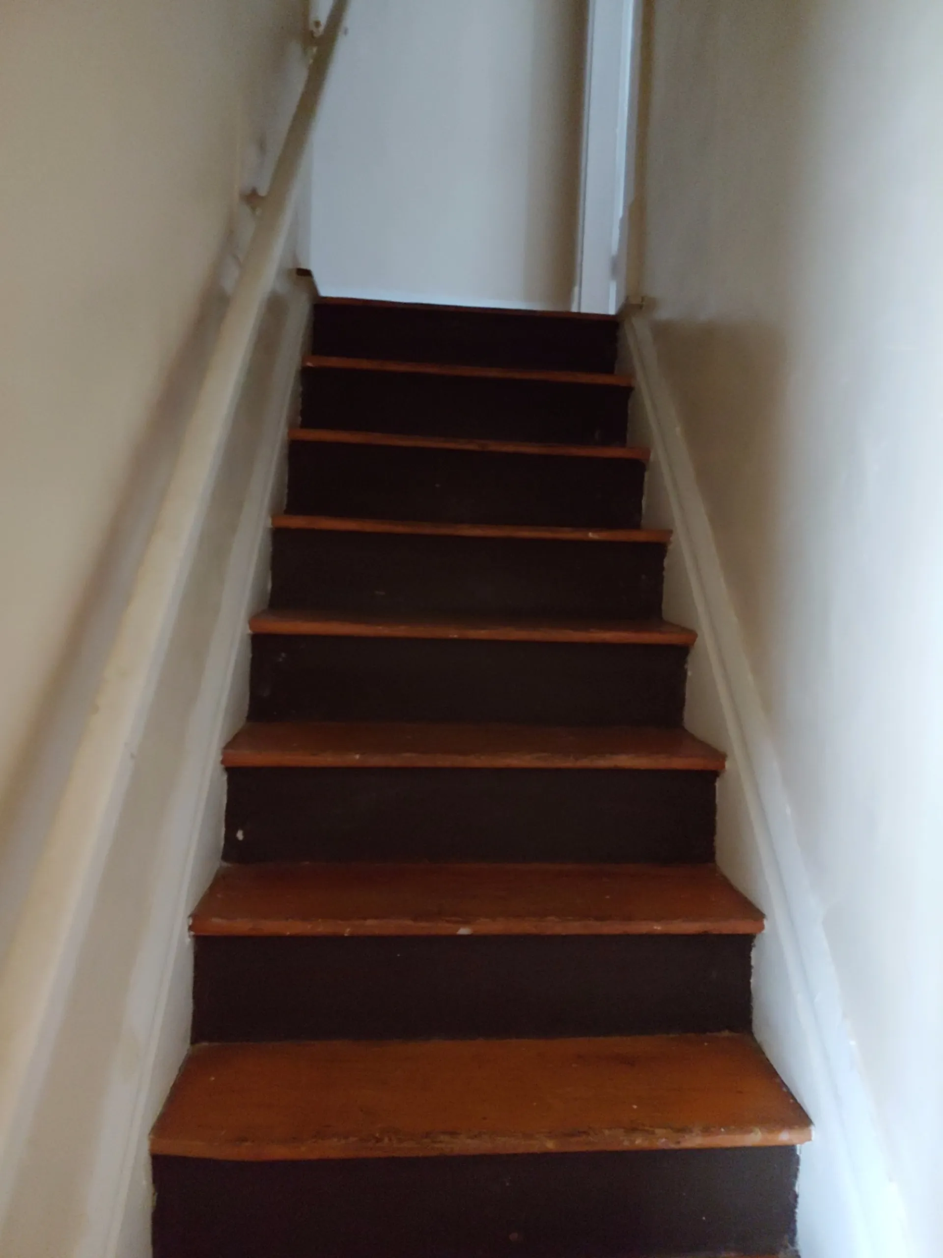 113 W 9th interior staircase to second floor