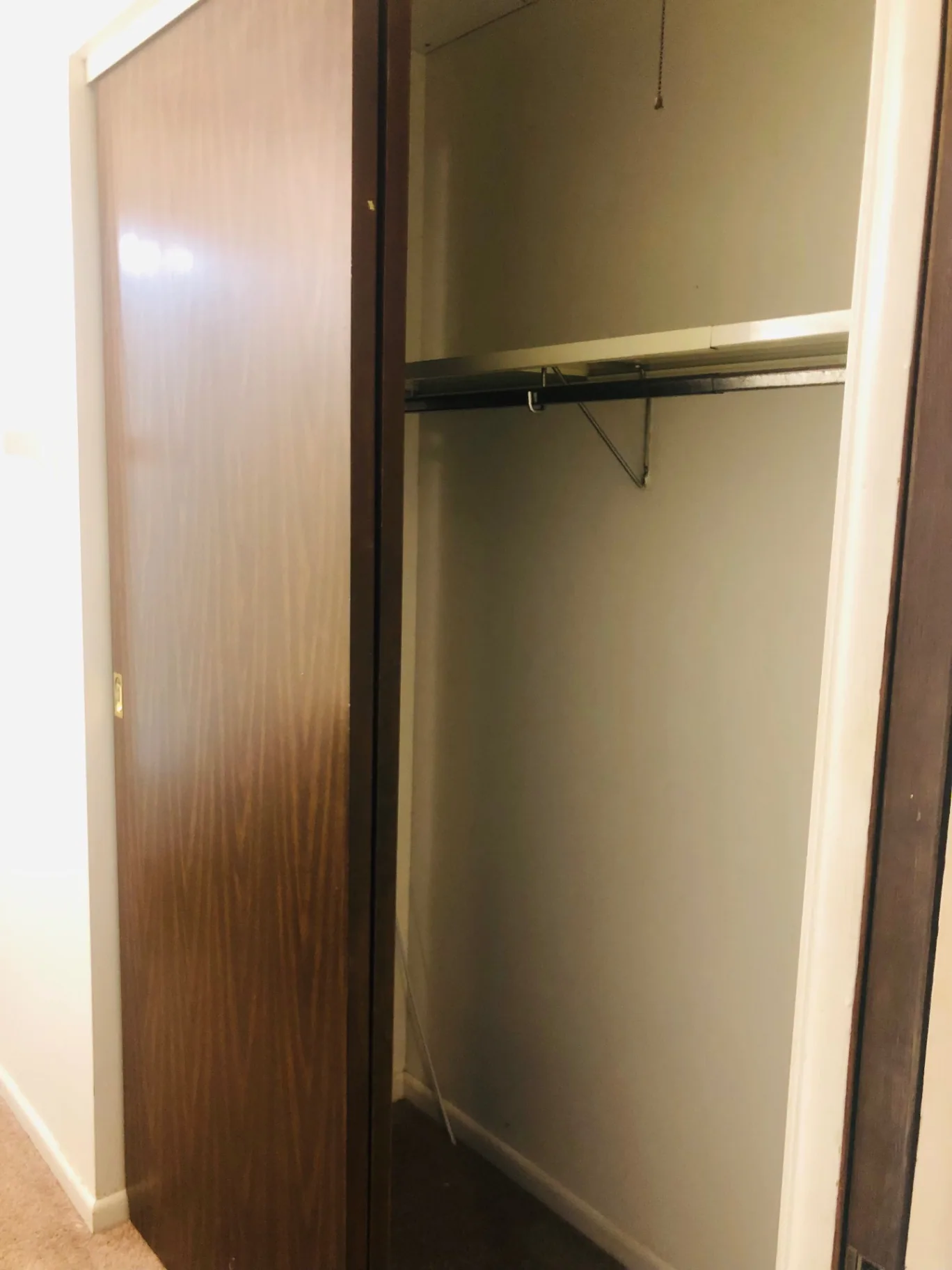 2028 Summit St. bedroom closet with hanging rod and shelf