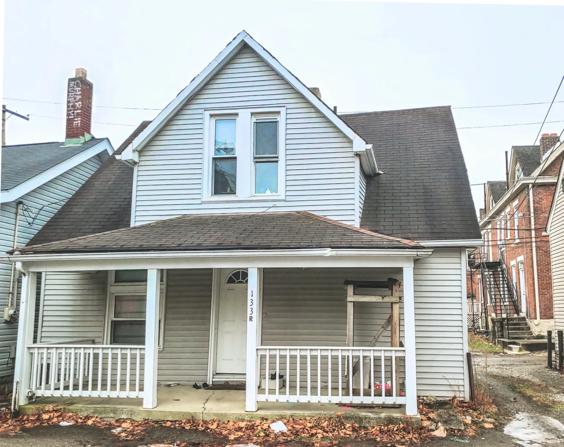 133R W 10th Ave. — rear unit exterior with covered front porch