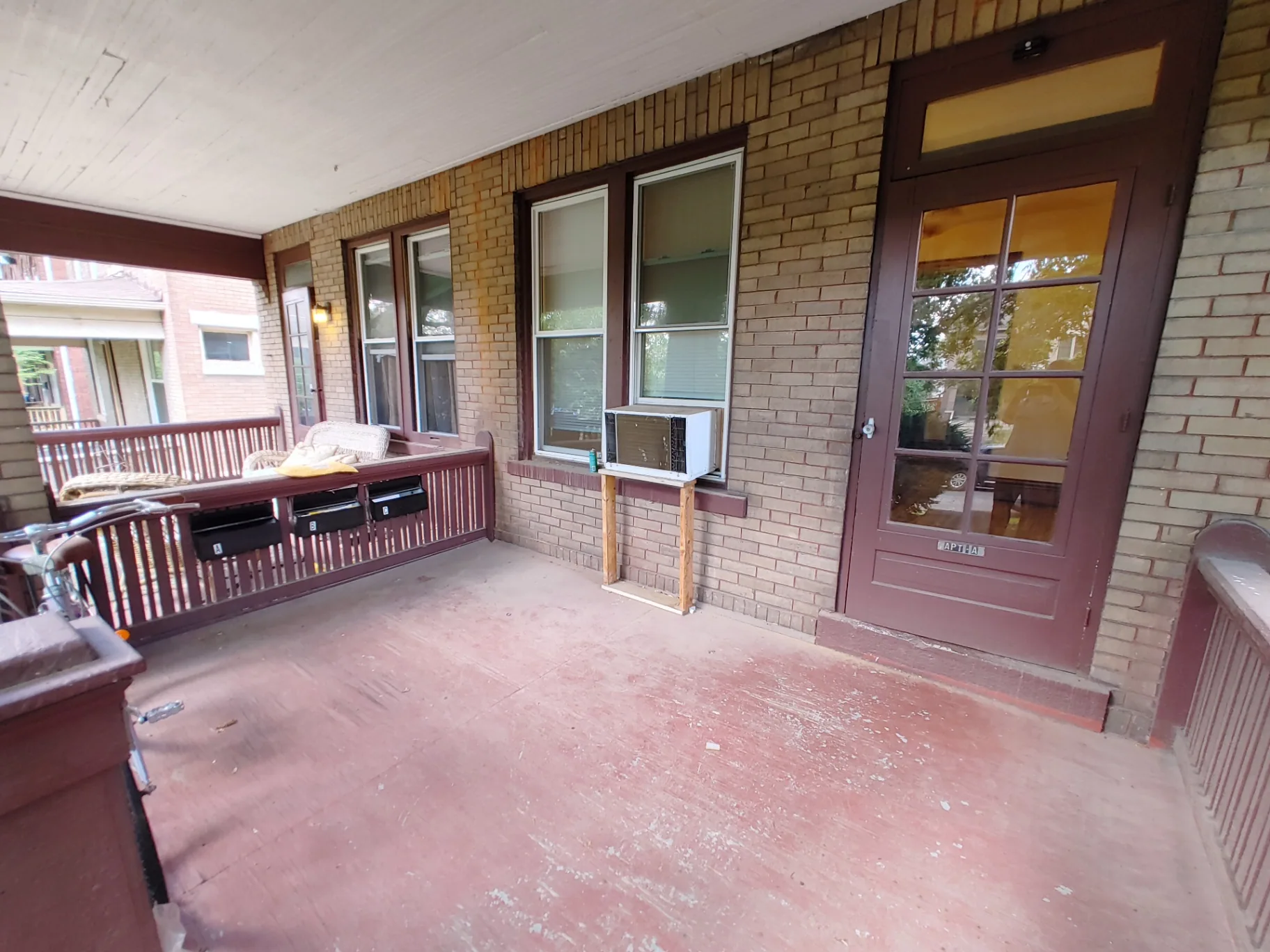 374 A E 14th Ave. covered front porch with brick columns and private entry door